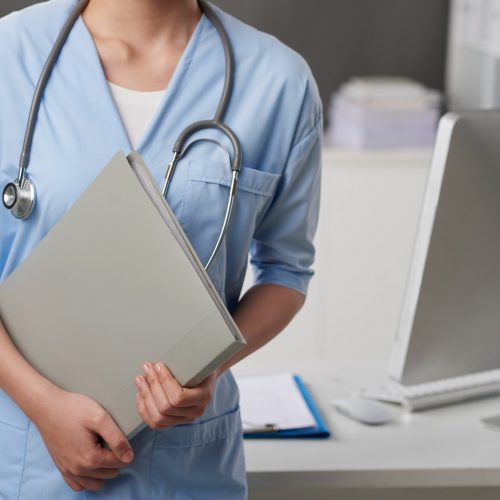 Nurse with medical documents